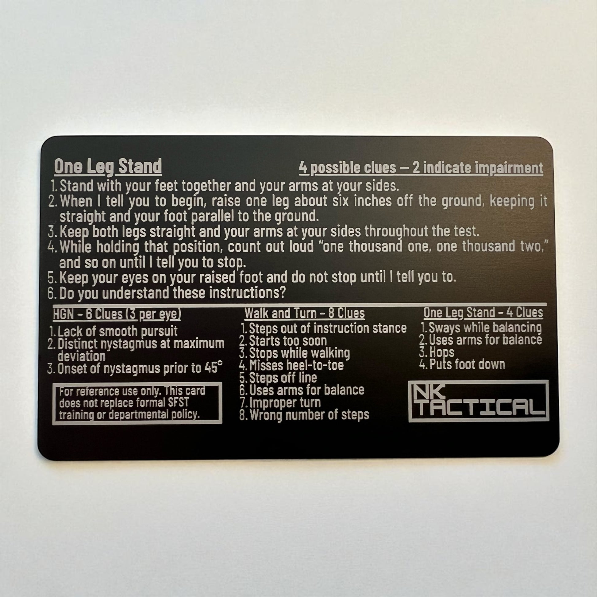 Back side of metal SFST instruction card showing One-Leg Stand test and clue summary, extra-thick laser-engraved anodized aluminum, made in USA.