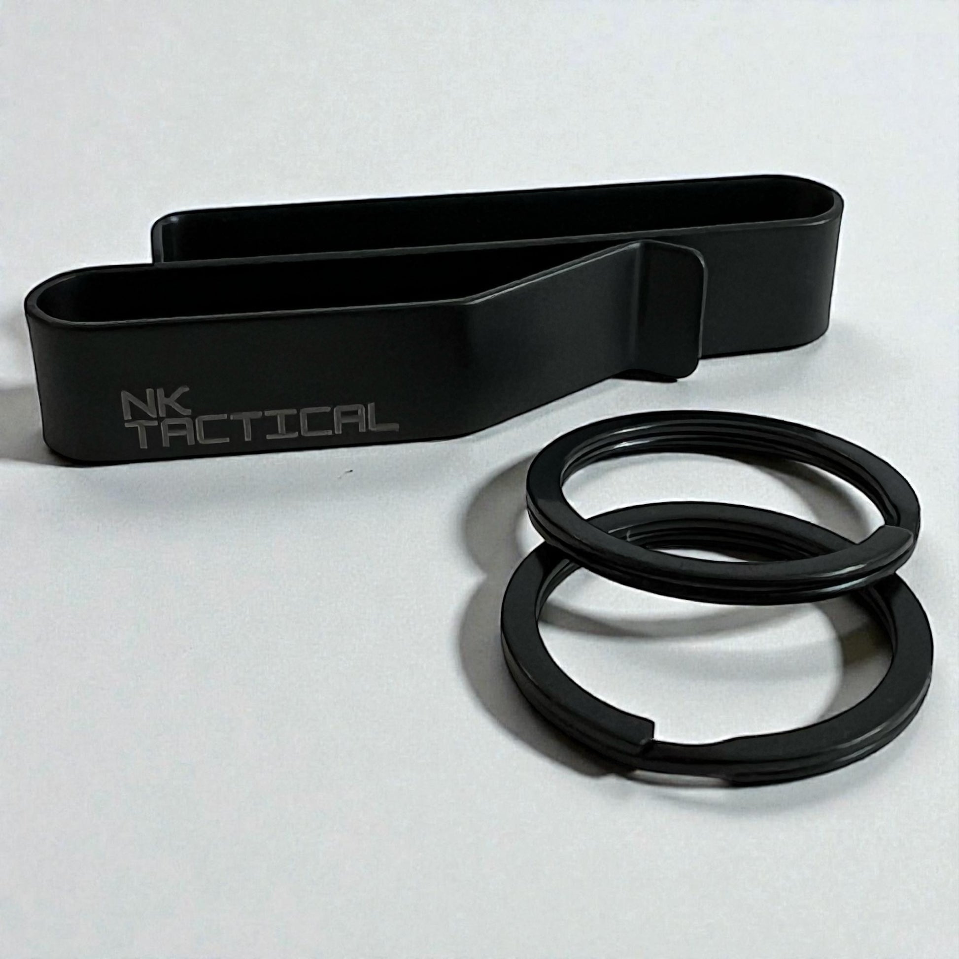 Side profile of NK Tactical KeyHold duty belt key holder highlighting low-profile design and stainless steel construction