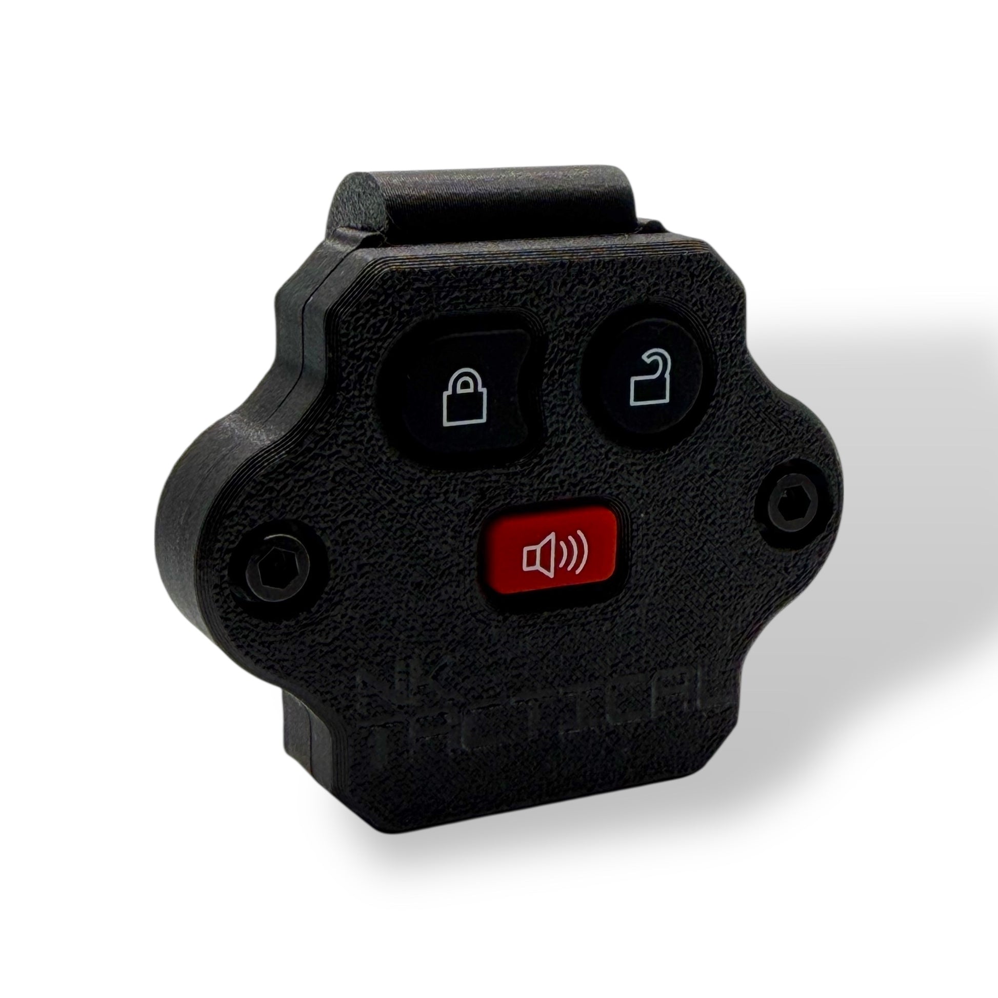 Front view of NK Tactical MOLLE key fob mount featuring textured grip surface and recessed hardware