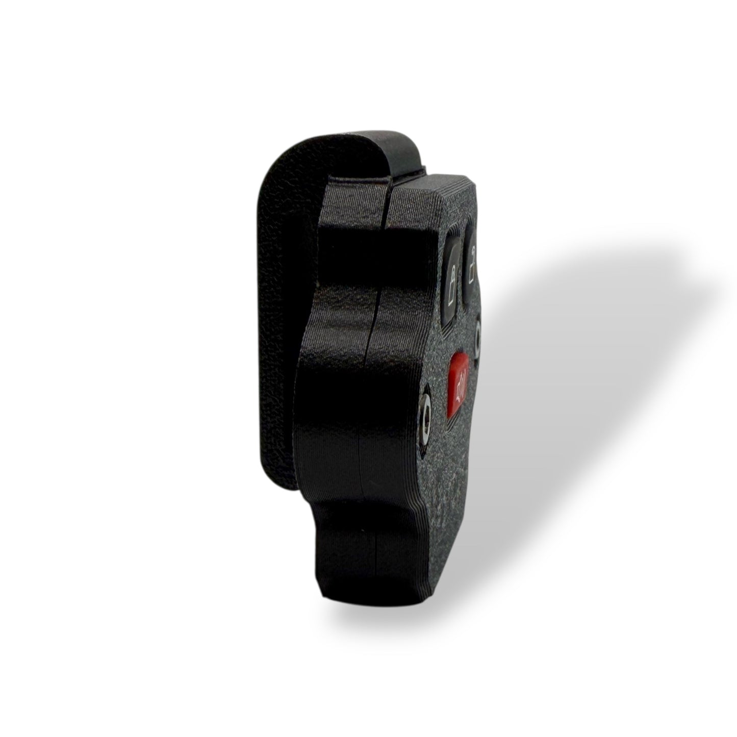 Side profile of NK Tactical MOLLE key fob mount showing low-profile, anti-snag design for duty vests