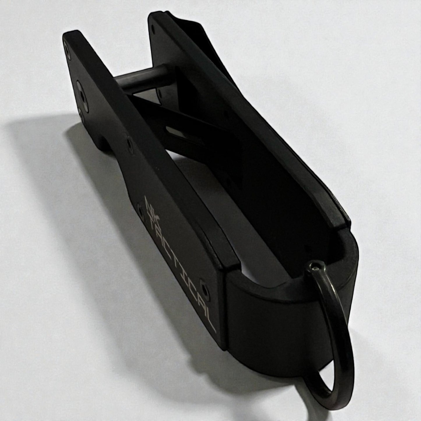 Internal view of NK Tactical KeyPoint key organizer showing stacked metal plates and press brake formed design