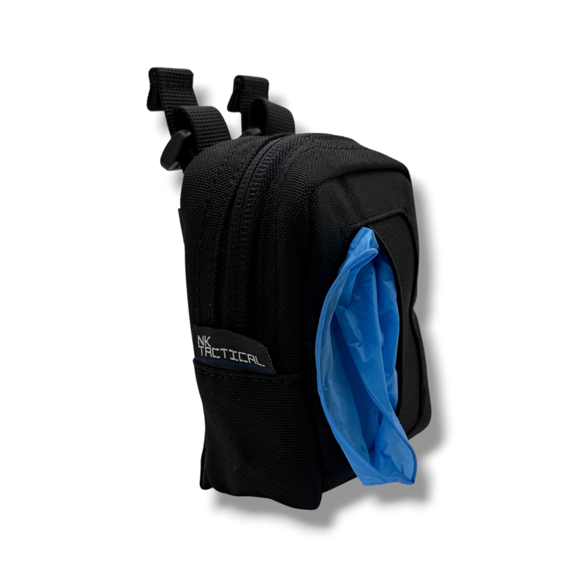 Angled view of GloveNest MOLLE glove dispenser dispensing blue nitrile gloves from front elastic opening