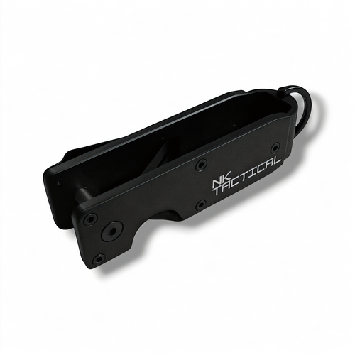 Open angled view of the NK Tactical KeyPoint compact key organizer showing the internal key storage channel and integrated attachment ring.