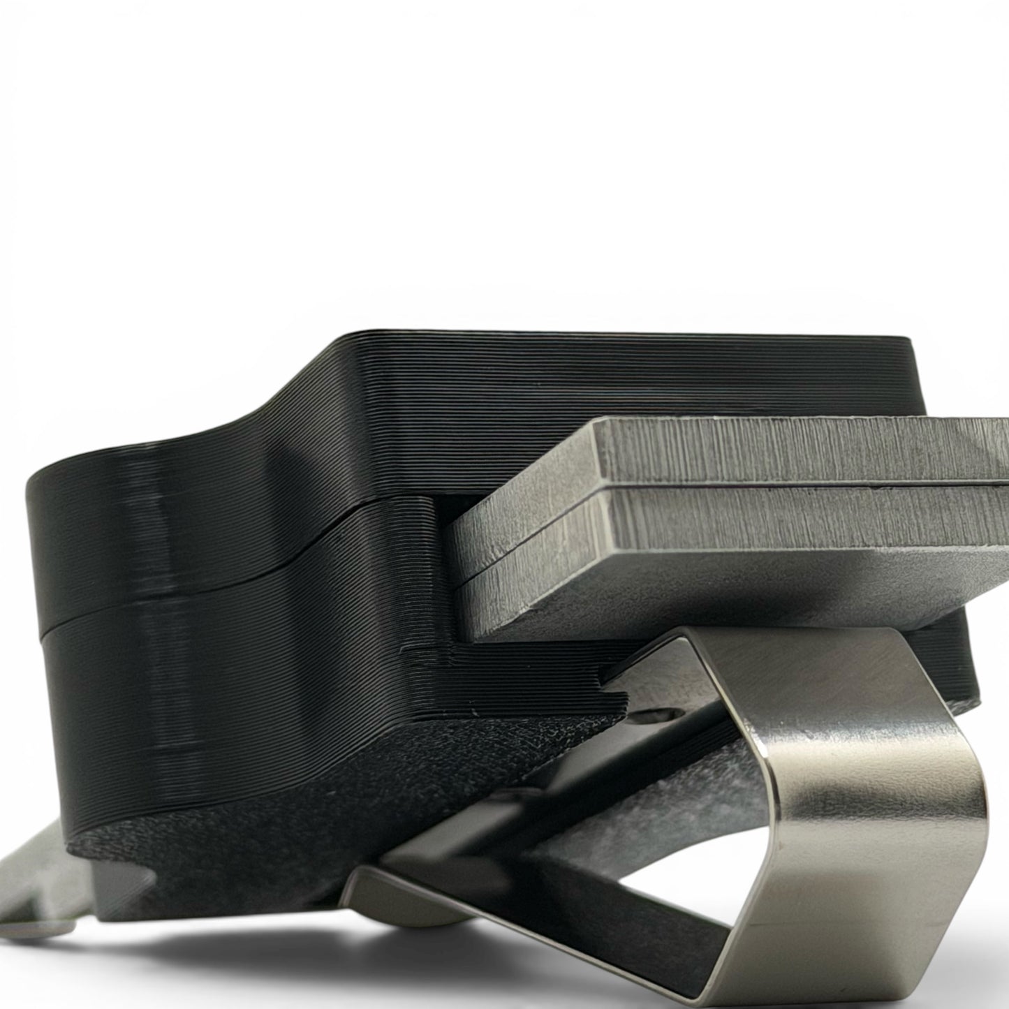 Close-up of police radar tuning forks held in visor holder with stainless steel clip and rubber insert